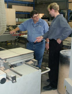 Tony Moffat and Pascal Bonnet tour the factory. 