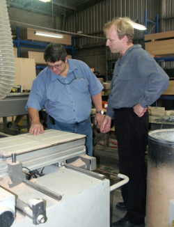 Tony Moffat and Pascal Bonnet tour the factory. 